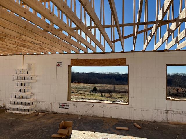 Interior view of framed window openings in an ICF wall looking out over open country.